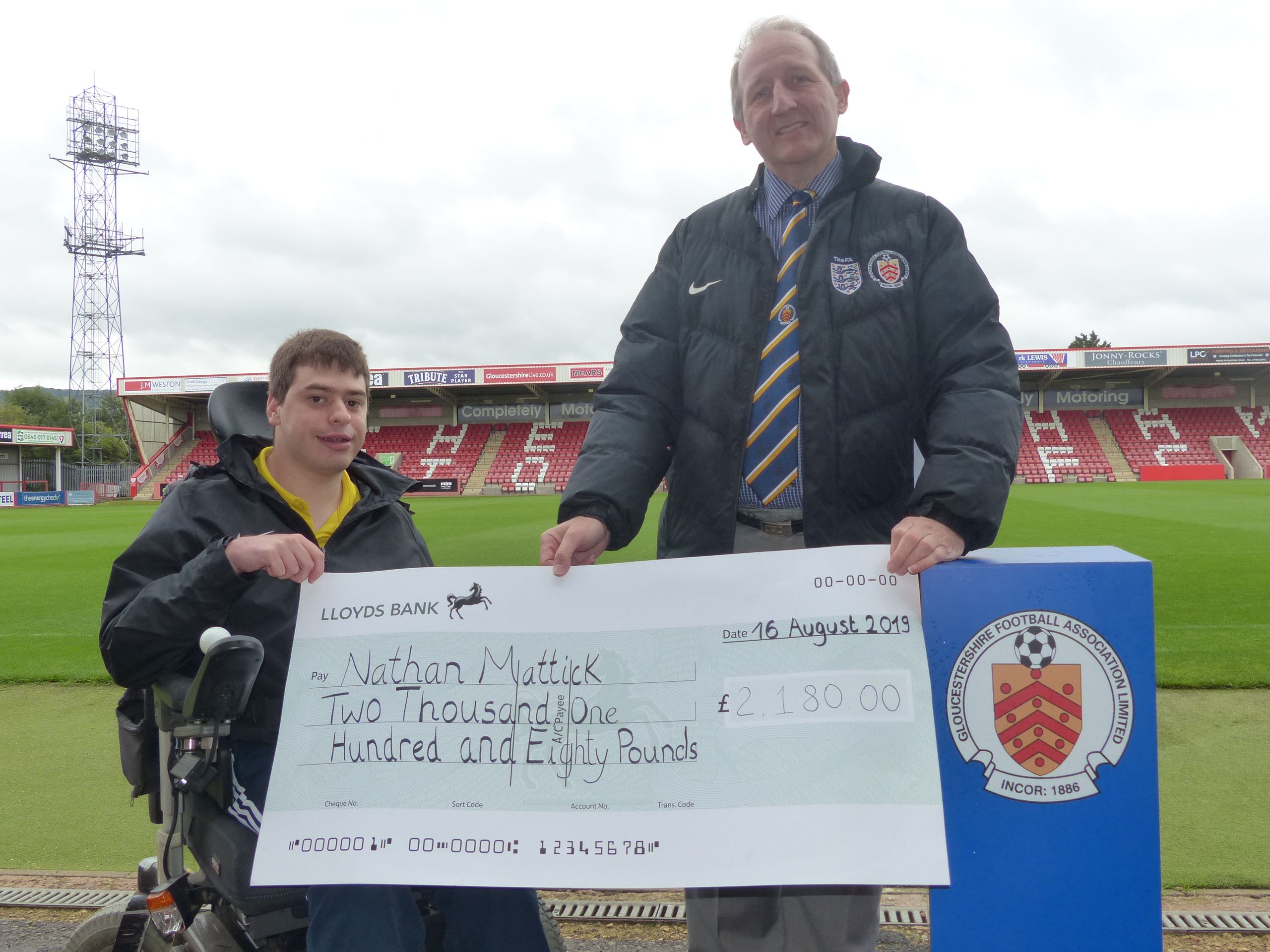 Nathan Mattick receiving cheque from GFA CEO, David Neale
