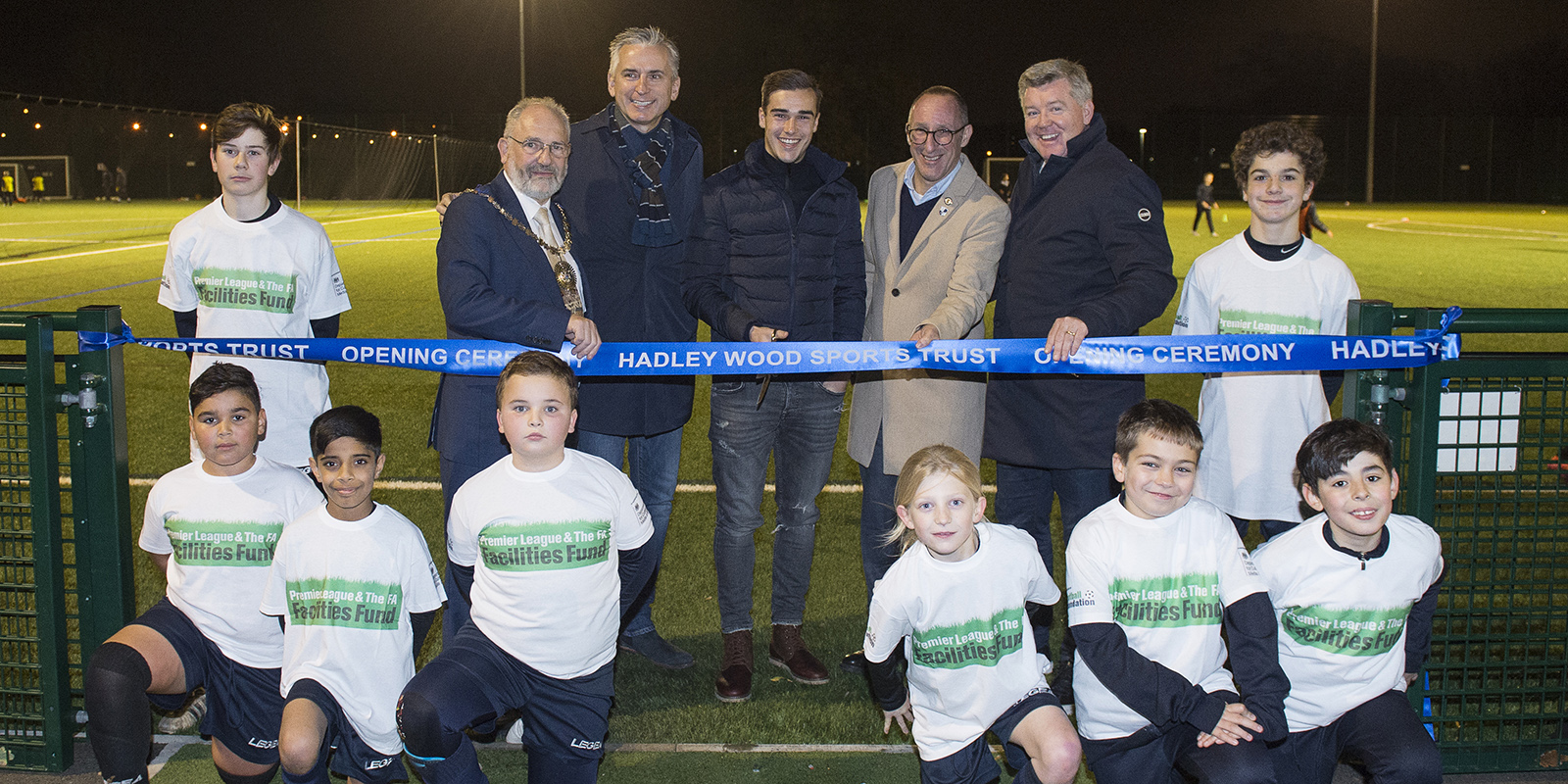 Geoff Shreeves, Harry Winks and Alan Smith unveil the brand new all-weather pitch at Hadley Wood
