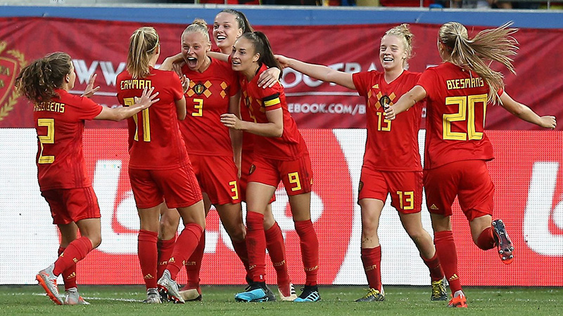 Belgium celebrate scoring one of their three goals against England