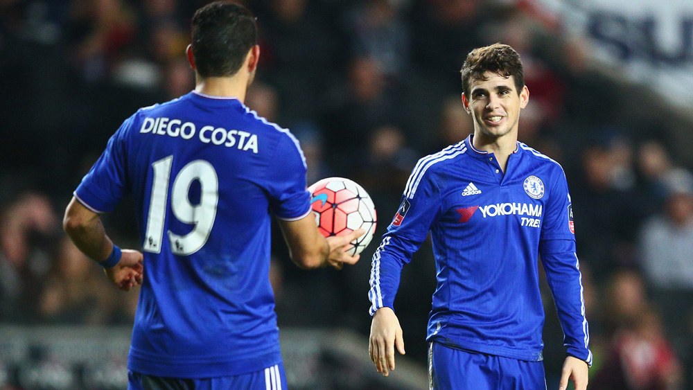 Diego Costa presents the matchball to hat-trick hero Oscar