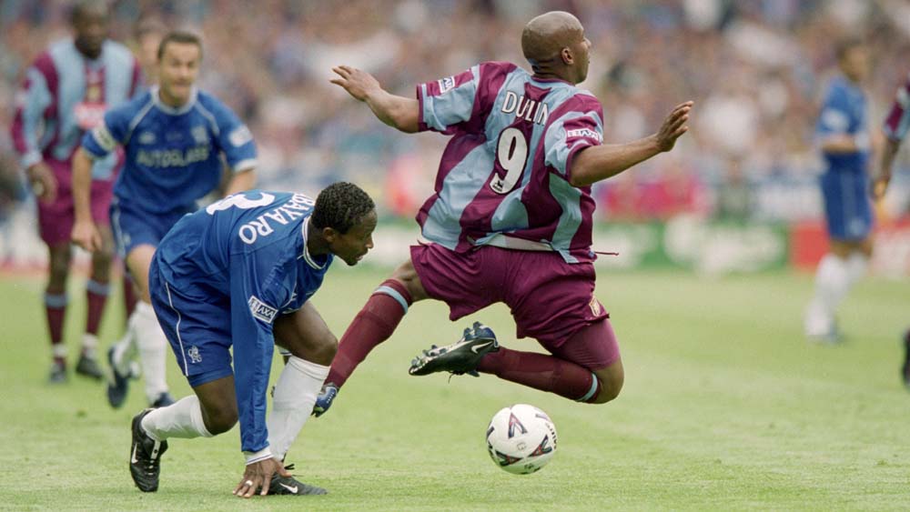 Dion Dublin is brought down during the 2000 FA Cup Final