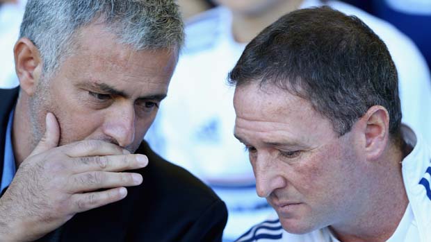 Chelsea manager Jose Mourinho chats to assistant Steve Holland.