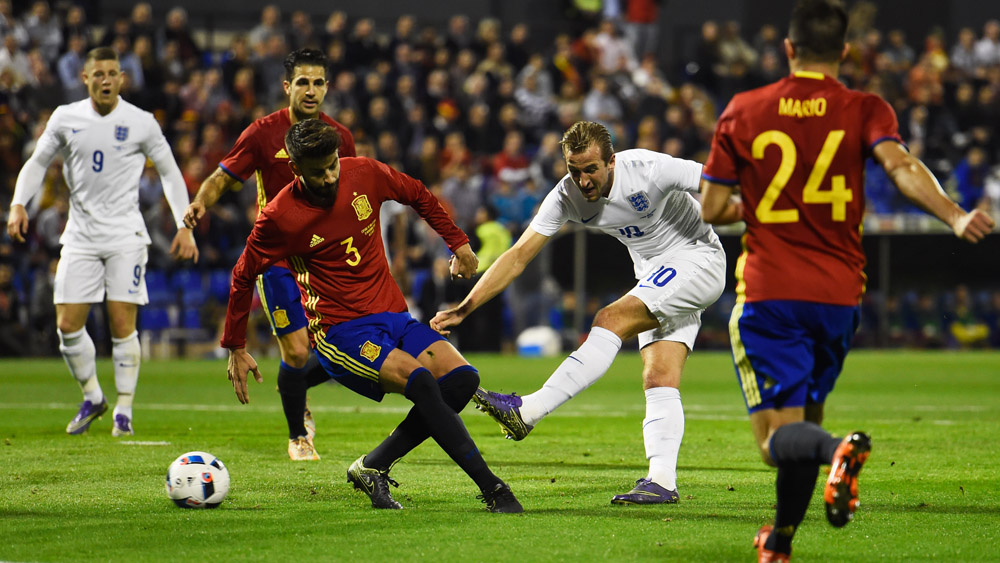 Harry Kane fires a shot on the Spain goal