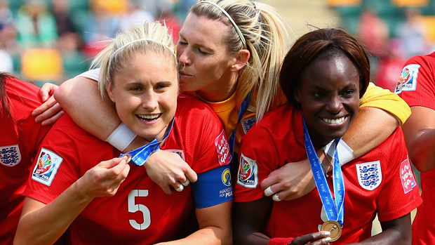 Steph Houghton (left) celebrates bronze with Carly Telford (centre) and Eniola Aluko