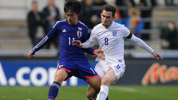England U19s captain Lewis Cook in a tussle against Japan