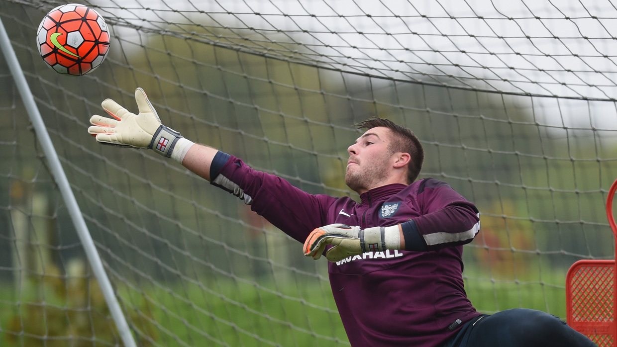 Jack Butland pulls off a save in training