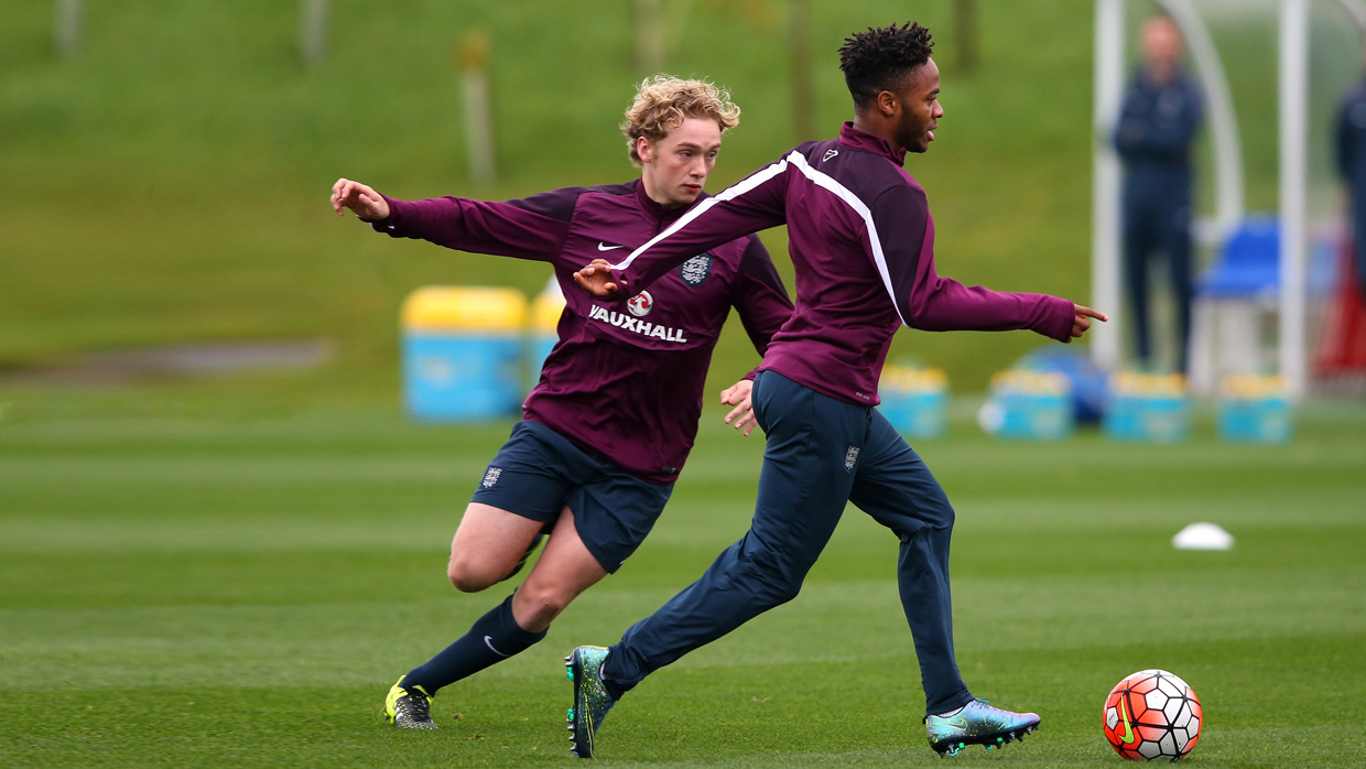 Tom Davies in action at training with Raheem Sterling for the senior squad