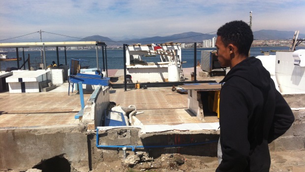 Alexander-Arnold examines the devastation of the tsunami