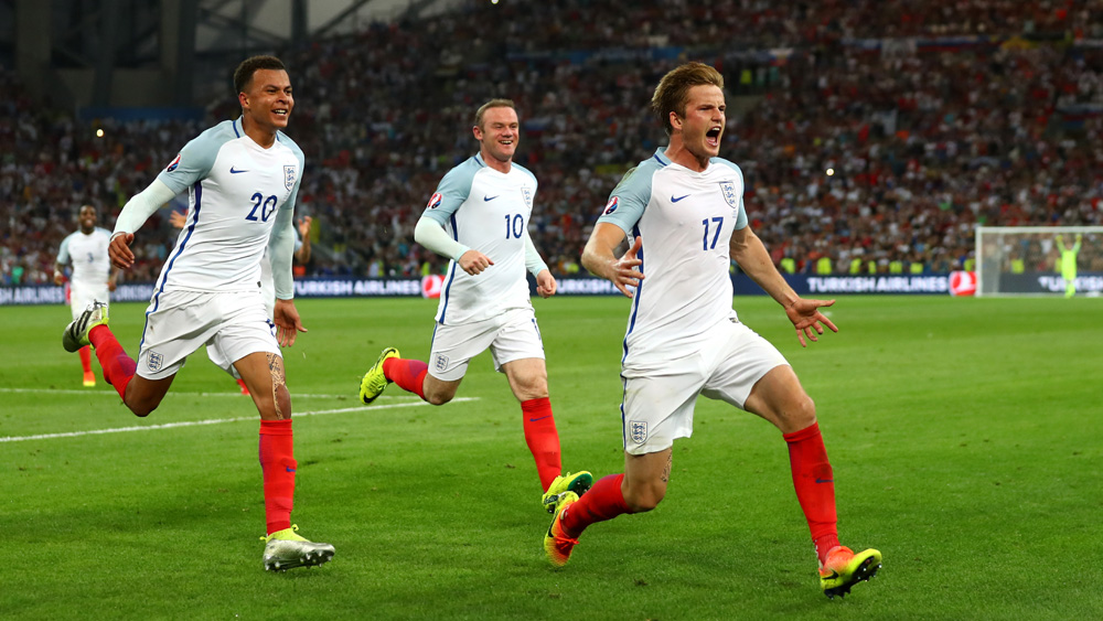 Eric Dier, right, celebrates his free-kick against Russia