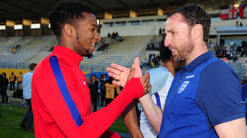 Gareth Southgate and Kasey Palmer celebrate victory in the Toulon Tournament.