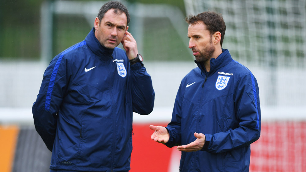 Paul Clement talks tactics with Gareth Southgate at St. George