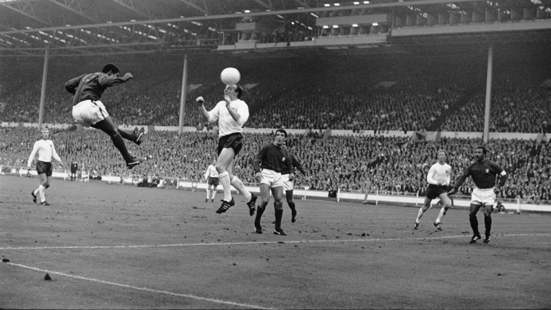 Eusebio in action against England at Wembley in 1966