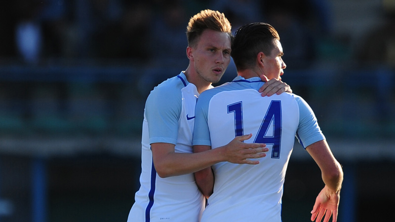 Jack Grealish is congratulated on his first England goal by Cauley Woodrow