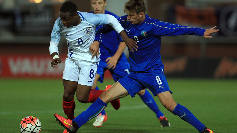 England Under-18s midfielder Dennis Adeniran in action against Italy