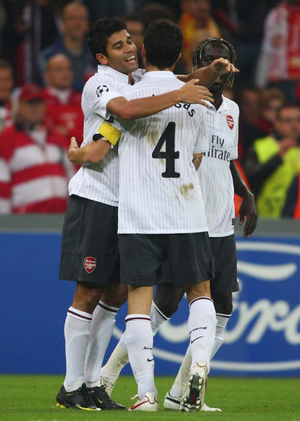 Arsenal celebrate a goal in the Champions League.