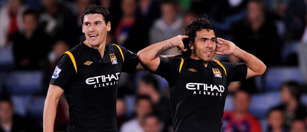 Gareth Barry and Carlos Tevez