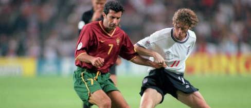 Steve McManaman takes on Luis Figo in the Euro 2000 Group A match
