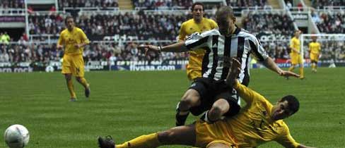 Newcastle United's Kieron Dyer in action against Tottenham in the FA Cup.
