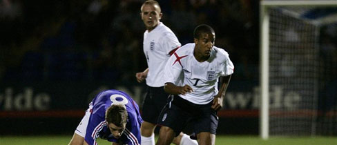 Scott Sinclair eases away from his marker during the defeat to France