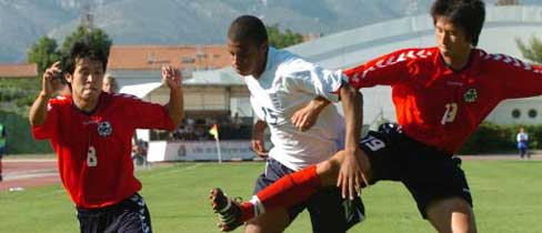 Tom Soares takes on the South Korean defence.