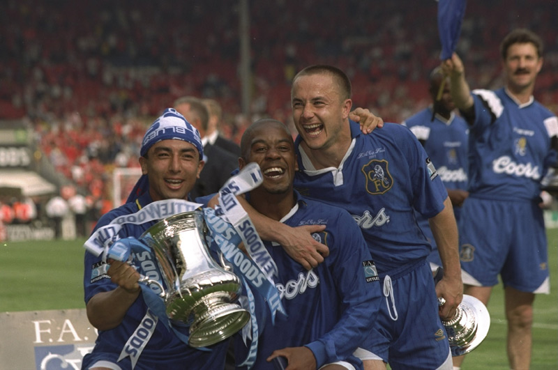Roberto Di Matteo (left), Eddie Newton (centre) and Dennis Wise celebrate Chelsea's FA Cup triumph in 1997.
