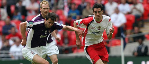 Peter Vincenti and Ben Purkiss tussle at Wembley.