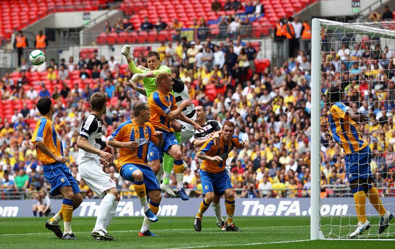 Darlington test the handling of Alan Marriott in The FA Trophy Final.