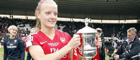 Katie Chapman, who opened the scoring for Arsenal, lifts The Cup.
