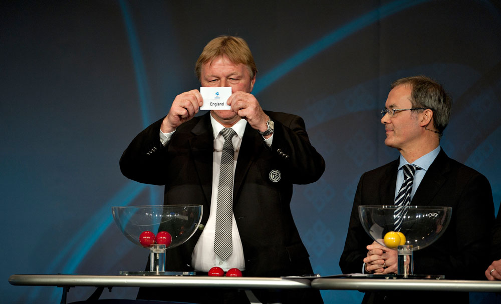 Germany U21 coach Horst Hrubesch pulls England's name out in the draw for Euro 2011 (Copyright Getty Images for UEFA)