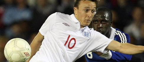 Mark Noble shields the ball