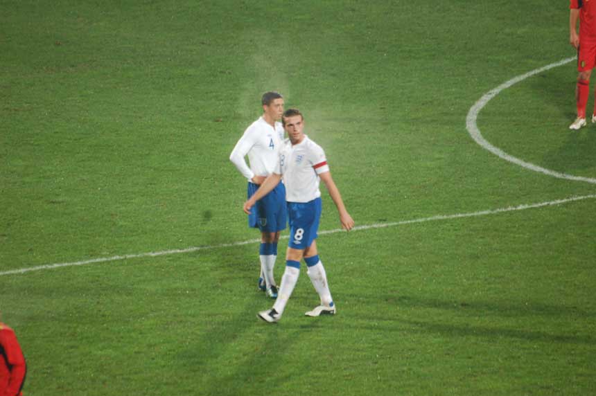 Jordan Henderson and Jason Lowe in action against Belgium.