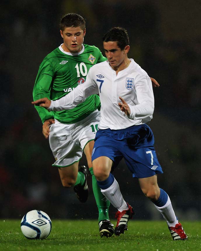 Lewis Cook in Victory Shield action.
