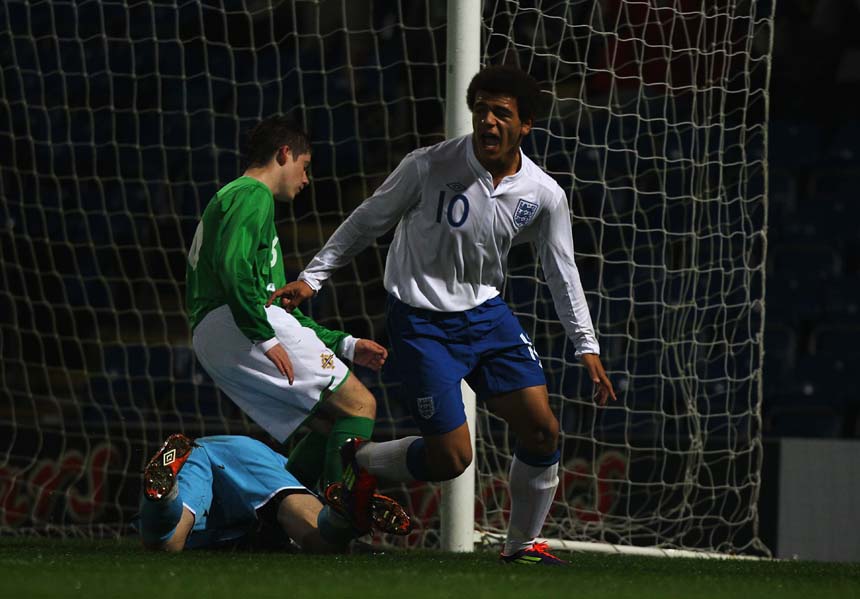 Mason Bennett celebrates his second goal against Northern Ireland.