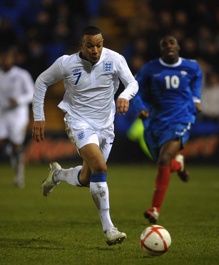 Matt Phillips runs with the ball against France.