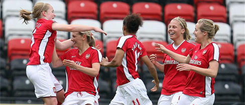 Arsenal celebrate Suzanne Grant's winning goal for the visitors.