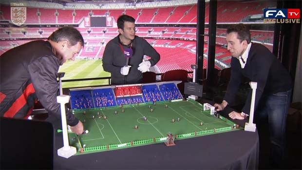 Bryan Robson takes on Christian O'Connell at Subbuteo at Wembley.