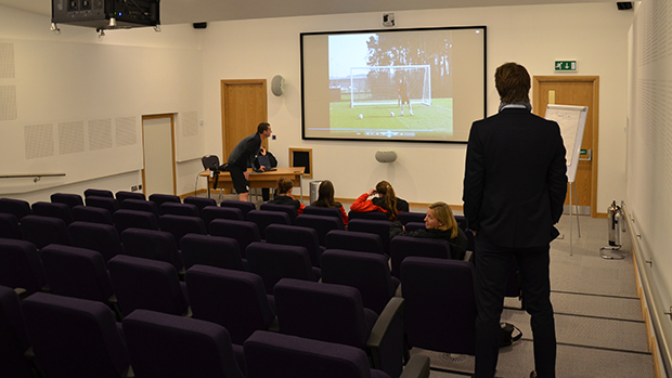 Edwin van der Sar looks in on a goalkeeping classroom session at St. George's Park