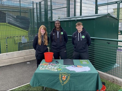 Lincolnshire FA Youth council behind a table
