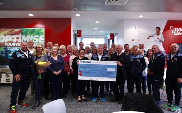 Pic 9 RAF FA Veterans presenting a cheque for £10,666.61 to the RAF Benevolent Fund at St George’s Park