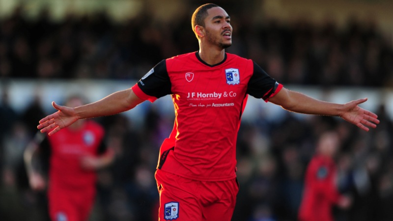 Byron Harrison scored two as Barrow knocked Bristol Rovers out of the Emirates FA Cup