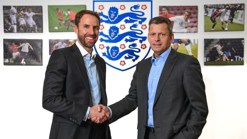 FA CEO Martin Glenn congratulates Gareth Southgate on his appointment