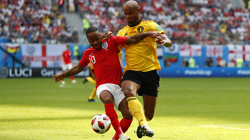 England's Raheem Sterling battles Vincent Kompany of Belgium