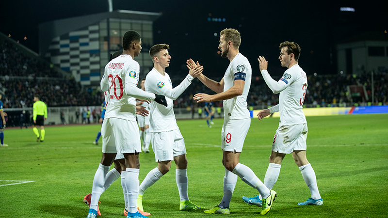 The team celebrate Mason Mount's goal taking the score to 4-0 to England