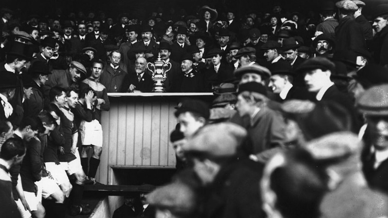 Bradford City players line up for the presentation of the FA Cup by C Crump (1911)