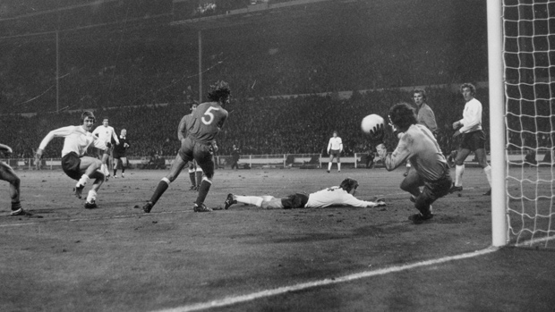 Poland 'keeper Jan Tomaszewski saves from Allan Clarke at Wembley in 1973