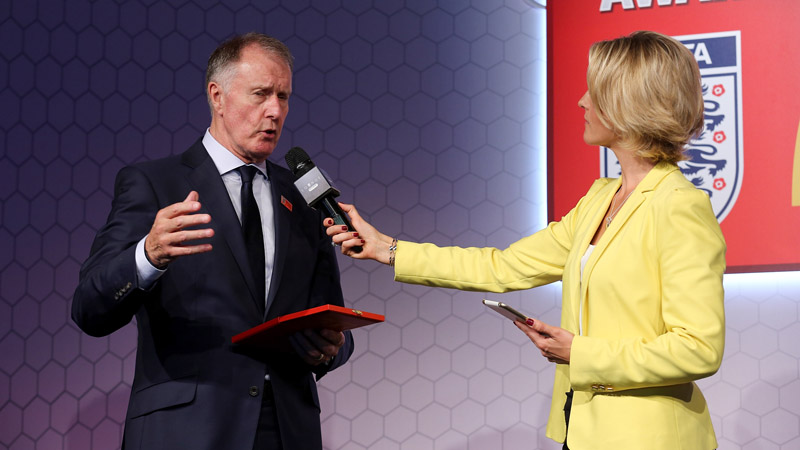 Sir Geoff Hurst prepares to present the People