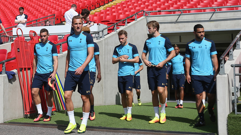 Harry Kane leads the Spurs squad out to train at Wembley Stadium