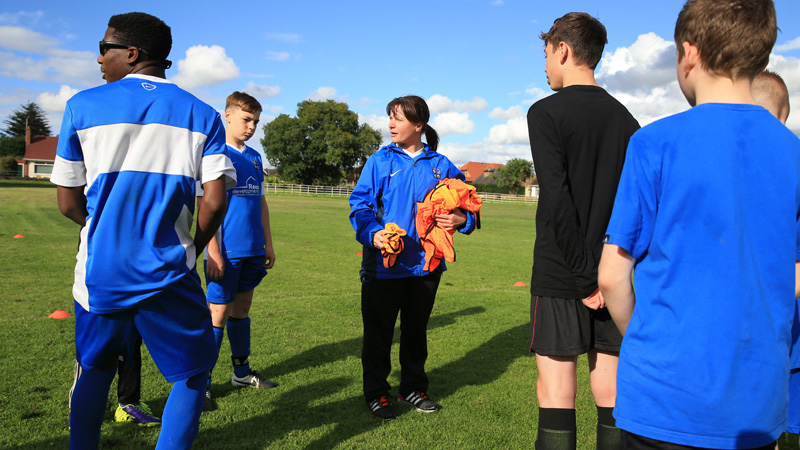 FA Community Award winner Lindsay Carrington takes a training session with her team