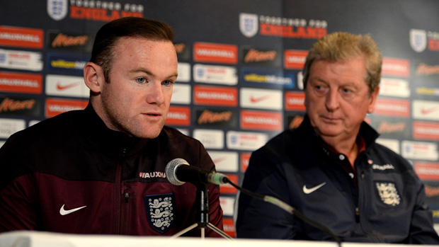 Wayne Rooney and Roy Hodgson speak to the press