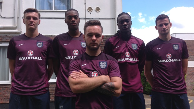 Adam Armstrong stands in front of (L-R) Dael Fry, Tosin Adarabioyo, Tammy Abraham and Elliot Moore